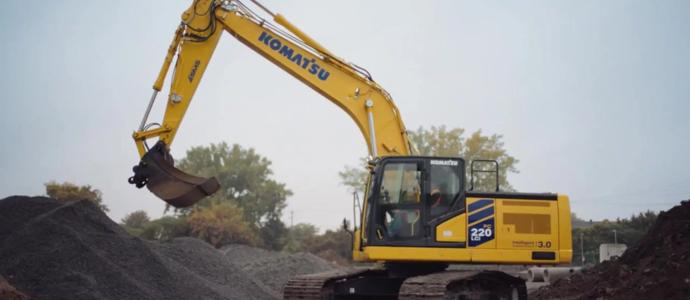 Komatsu PC220LCi-12 excavator working