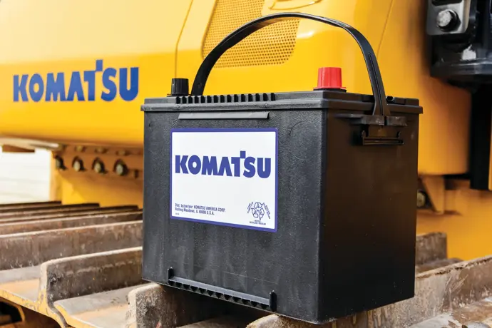 Komatsu battery on an excavator track